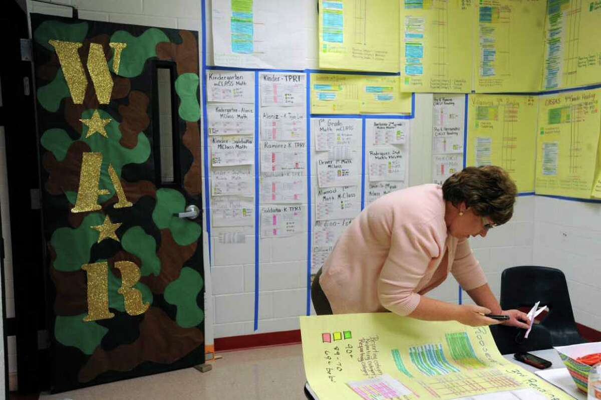 Roosevelt Elementary School principal Pamela Reece works in the school's War Room on Tuesday, Jan. 17, 2012. BILLY CALZADA / San Antonio Express-News