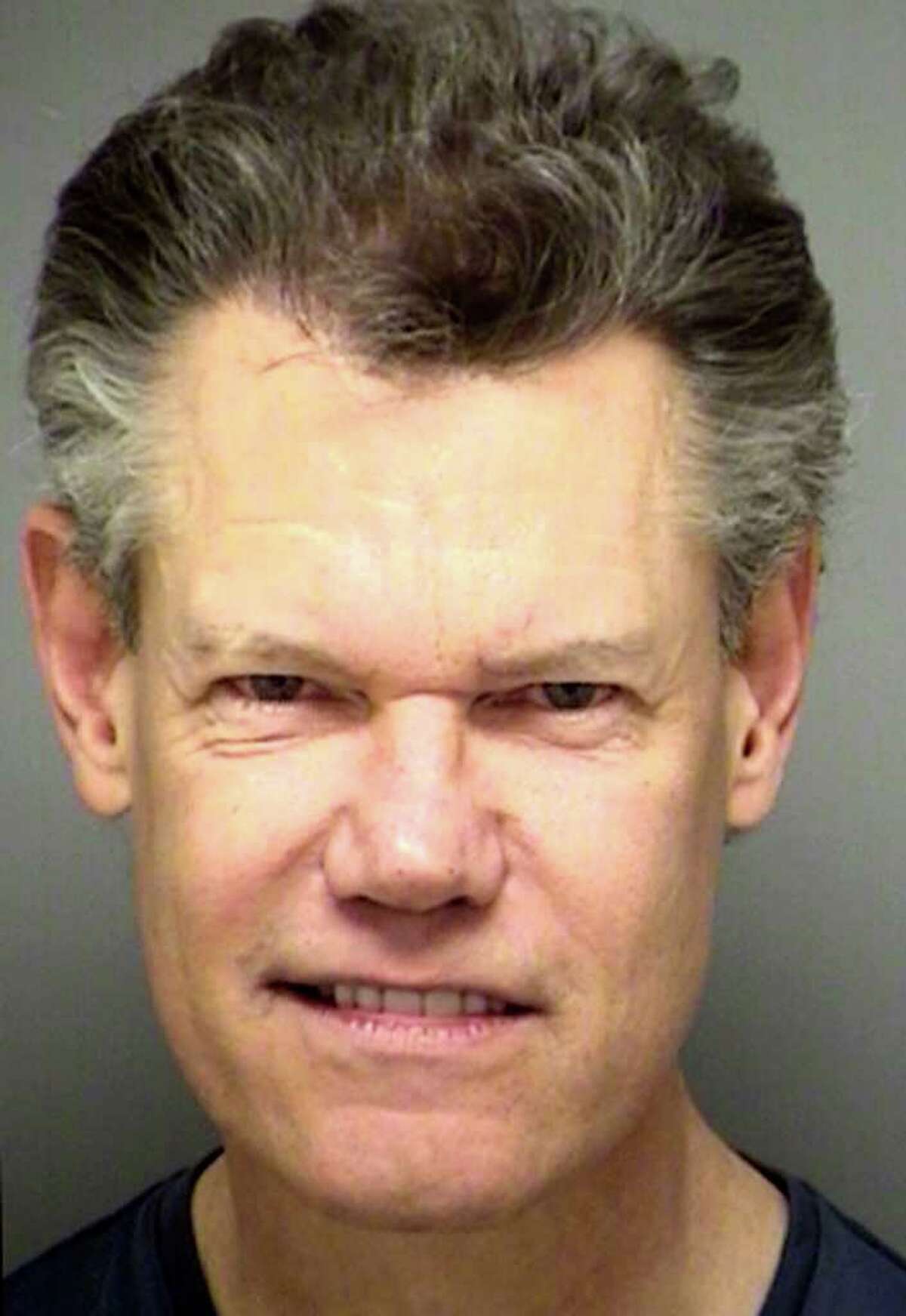 This Feb. 6, 2012 booking photo provided by the Denton County Sheriff's Department in Texas, shows country music star Randy Travis. Travis was arrested in Sanger, Texas, on Monday, Feb. 6, 2012, on a charge of public intoxication.