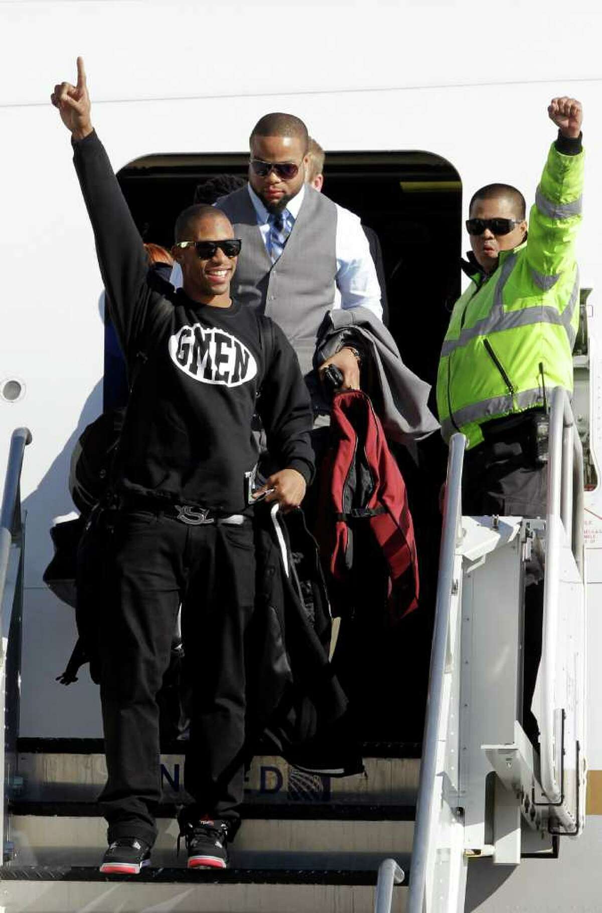 New York Giants - Super Bowl Football New York Giants wide receiver Victor  Cruz (80) holds the Vince Lombardi Trophy during the Super Bowl XLVl  football game against the New England Patriots