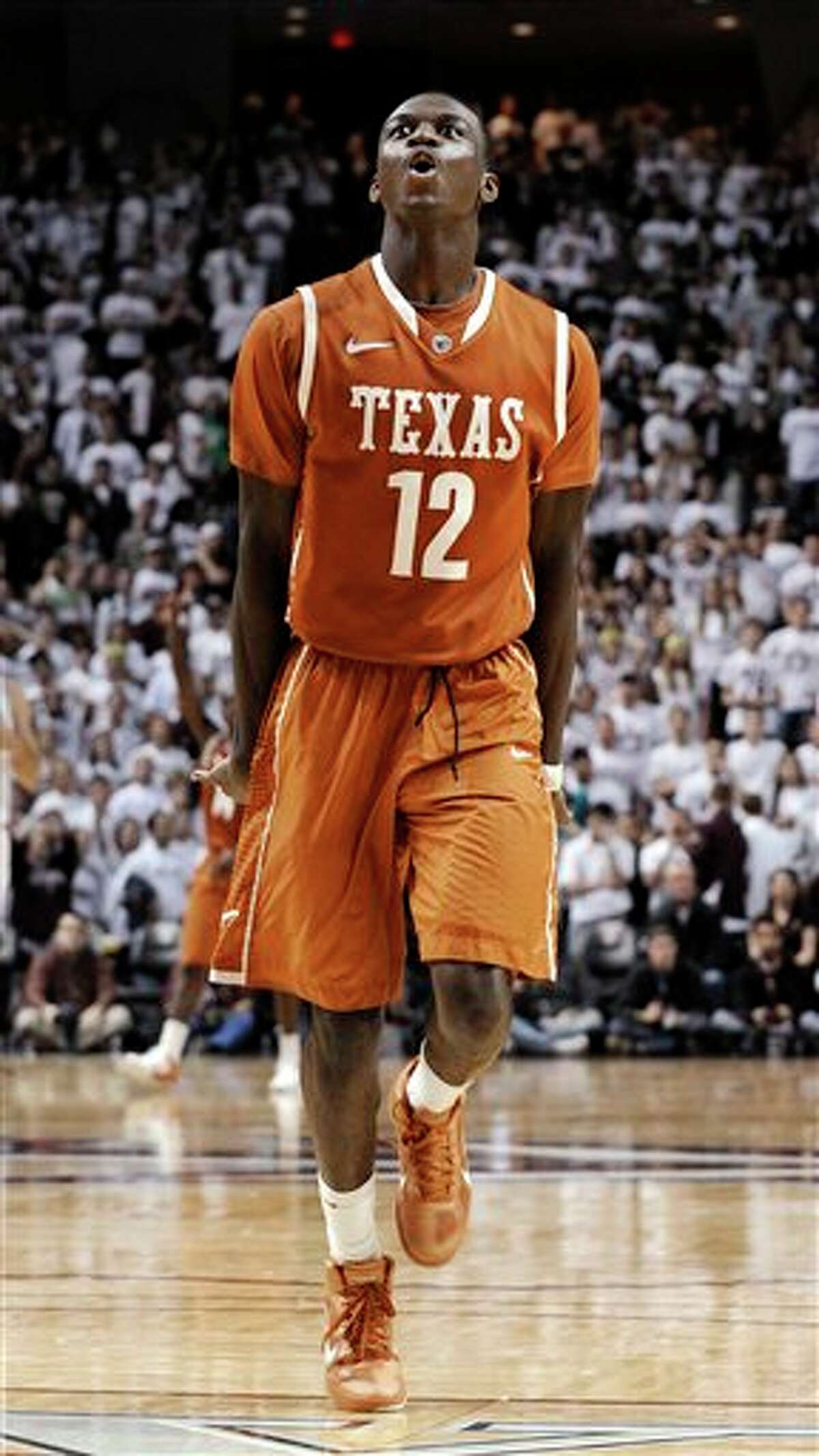 Texas' Myck Kabongo celebrates at the end of an NCAA college basketball game against Texas A&M on Monday, Feb. 6, 2012, in College Station, Texas. Texas won 70-68. (AP Photo/Pat Sullivan)