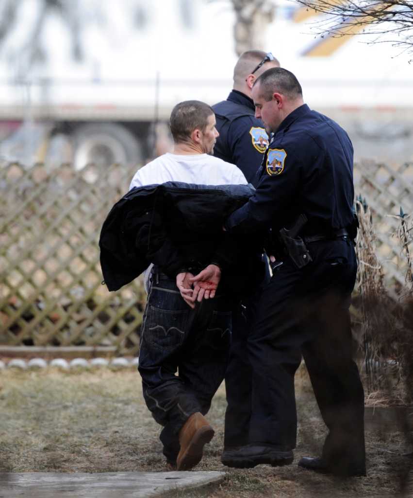 Photos: Man in custody after foot chase
