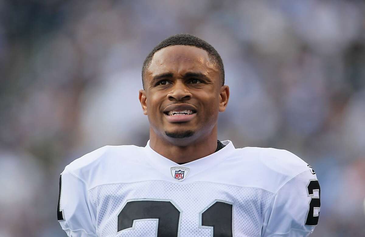 SAN DIEGO - DECEMBER 05: Nnamdi Asomugha #21 the Oakland Raiders looks on from the sideline against the San Diego Chargers at Qualcomm Stadium on December 5, 2010 in San Diego, California. The Raiders defeated the Chargers 28-13. (Photo by Jeff Gross/Getty Images)
