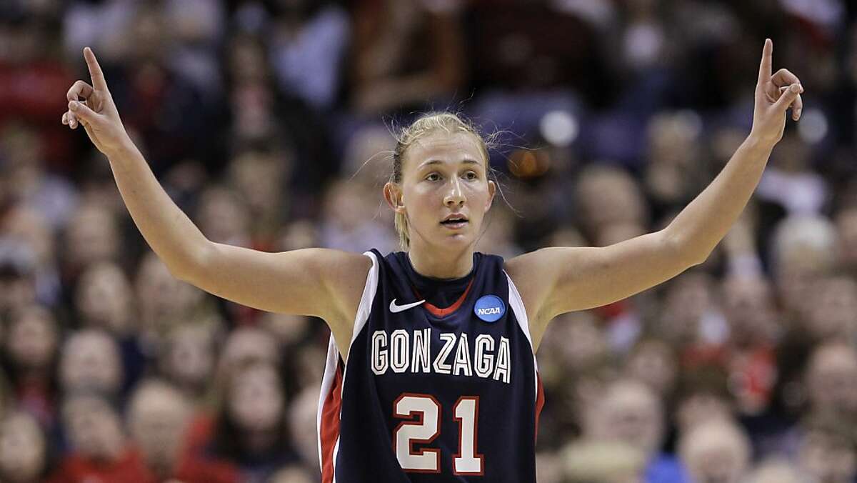 Gonzaga's Courtney Vandersloot signals after a team score against Louisville in the second half of an NCAA women's college basketball tournament regional semifinal, Saturday, March 26, 2011, in Spokane, Wash. Gonzaga won 76-69.