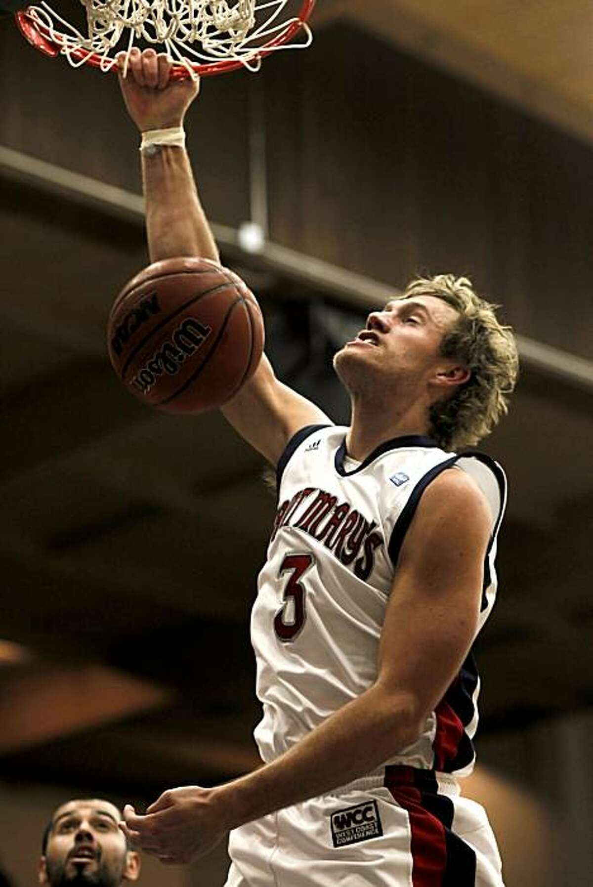 Gael's Mitchell Young, (3) with a slam dunk during first half action as the St. Mary's Gaels take on the Hartford Hawks at McKeon Pavilion in Moraga, Calif. on Friday Dev. 31, 2010.