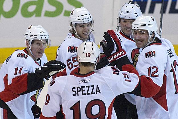 Ottawa Senators' Jason Spezza, left, celebrates after scoring a goal in the  second period of an NHL hockey game against the Boston Bruins on Saturday,  Jan. 23, 2010, in Boston. The Senators