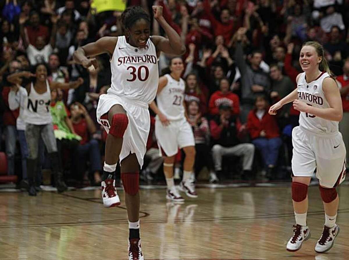 Nneka Ogwumike and Lindy La Rocque whoop it up after the Stanford Cardinal's 71-59 win over the UConn Huskies at Maples Pavilion in Stanford, Calif., on Thursday, Dec. 30, 2010.
