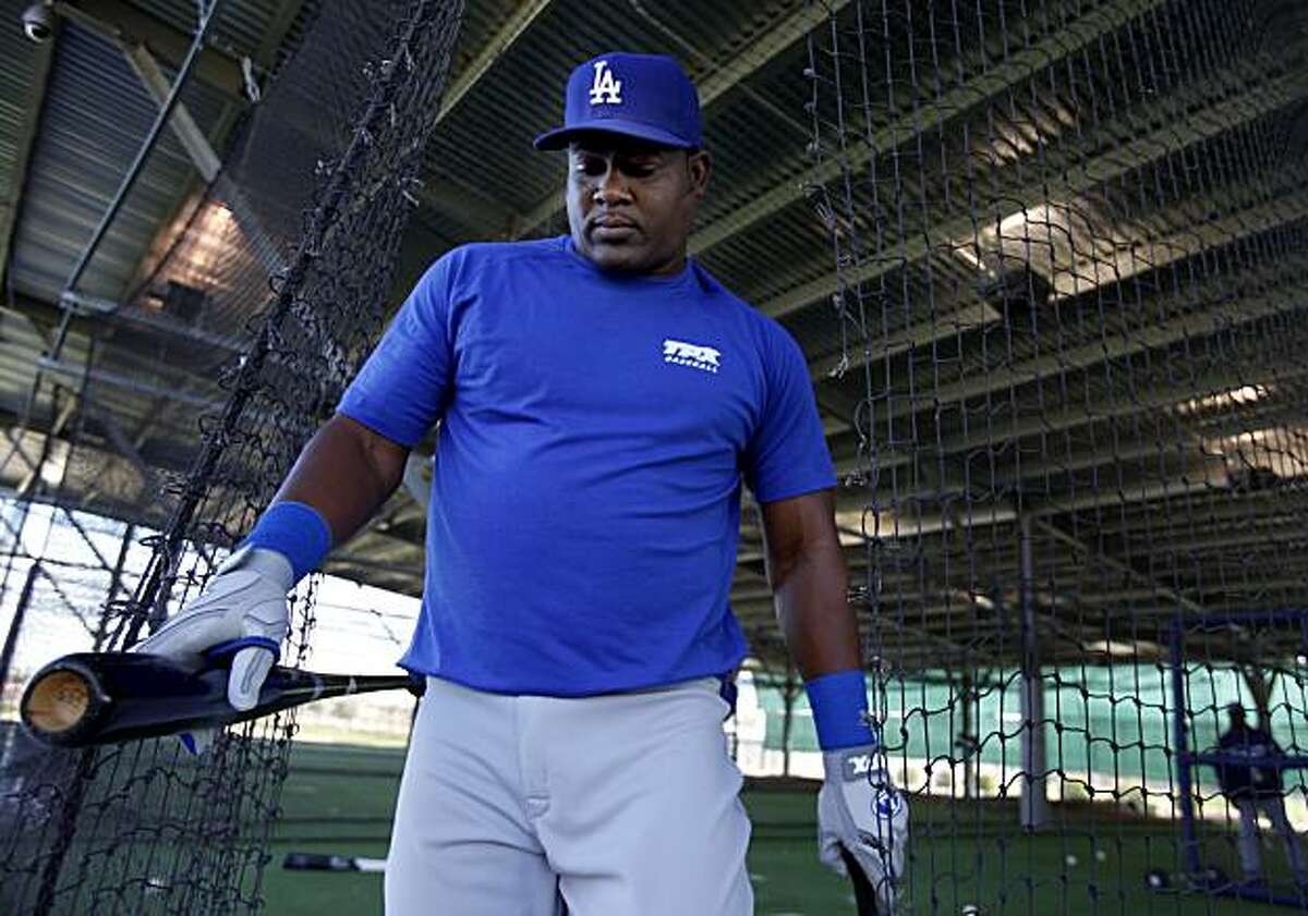Juan Uribe left the batting cages at the Glendale facility. The San Francisco Giants shortstop of 2010, Juan Uribe is now playing for the Los Angeles Dodgers. He reported to camp at their Glendale, Az. facility Monday February 21, 2011.