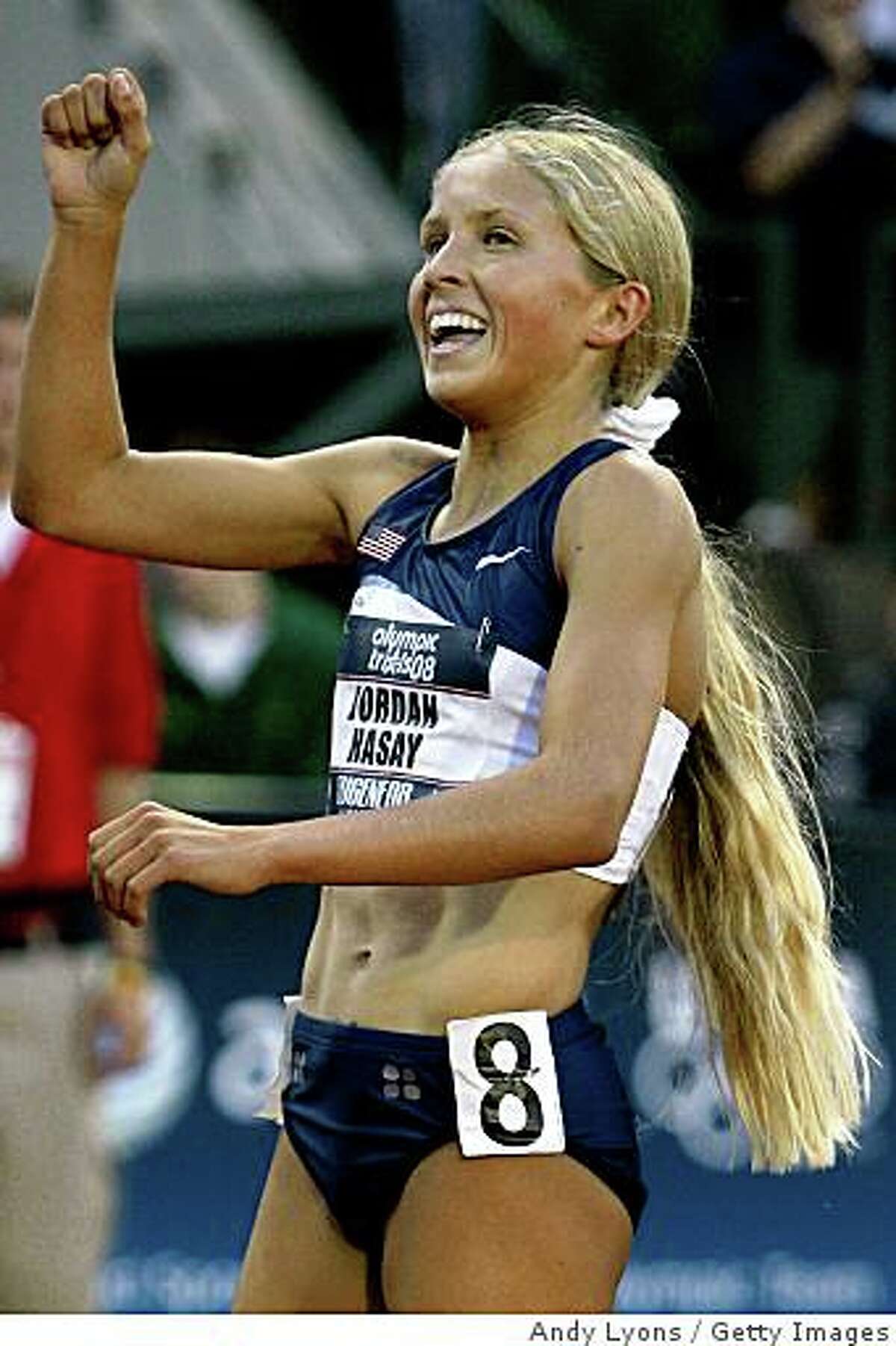 EUGENE, OR - JULY 04: Jordan Hasay celebrates after qualifying for the finals and a new American High School record time in the women's 1,500 meter semi-finals during day six of the U.S. Track and Field Olympic Trials at Hayward Field on July 4, 2008 in Eugene, Oregon. (Photo by Andy Lyons/Getty Images)