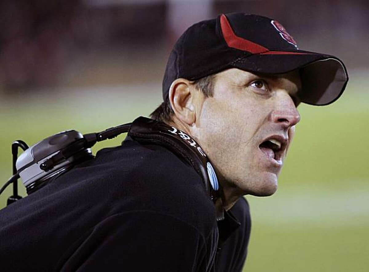 Stanford head coach Jim Harbaugh watches an NCAA college football game against Oregon State in the second quarter in Stanford, Calif., Saturday, Nov. 27, 2010.