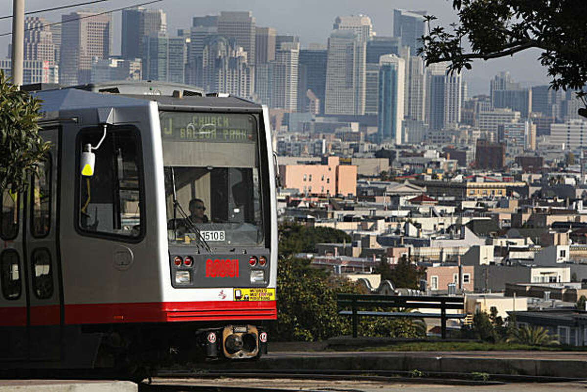 A J line car travels along the tracks at 20th and Church Streets on Friday, November 26, 2010 in San Francisco, Calif.