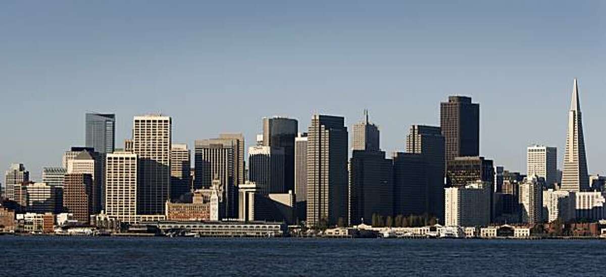 The downtown skyline is bathed in morning sunlight in San Francisco, Calif., on Tuesday, April 14, 2009 where many small commercial buildings are behind on payments to lenders and could face foreclosure.