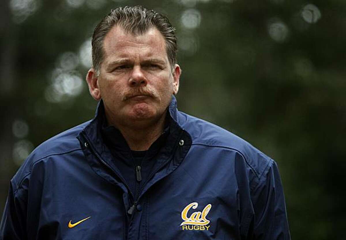 Head coach Jack Clark watches his Cal Bears rugby players run to the top of a steep fire trail as part of the team's annual April Drive training period in Berkeley, Calif., on Wednesday, April 8, 2009.