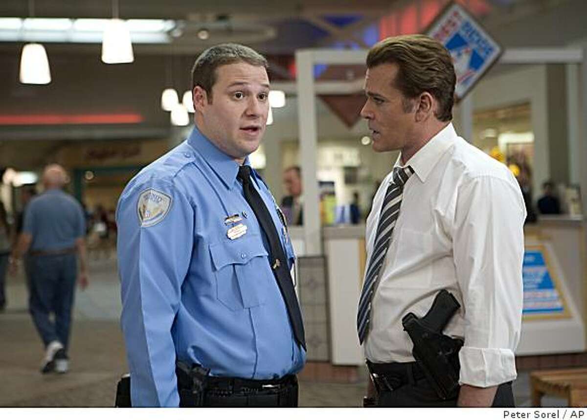 In this image released by Warner Bros., Seth Rogen, left, and Ray Liotta are shown in a scene from "Observe and Report."