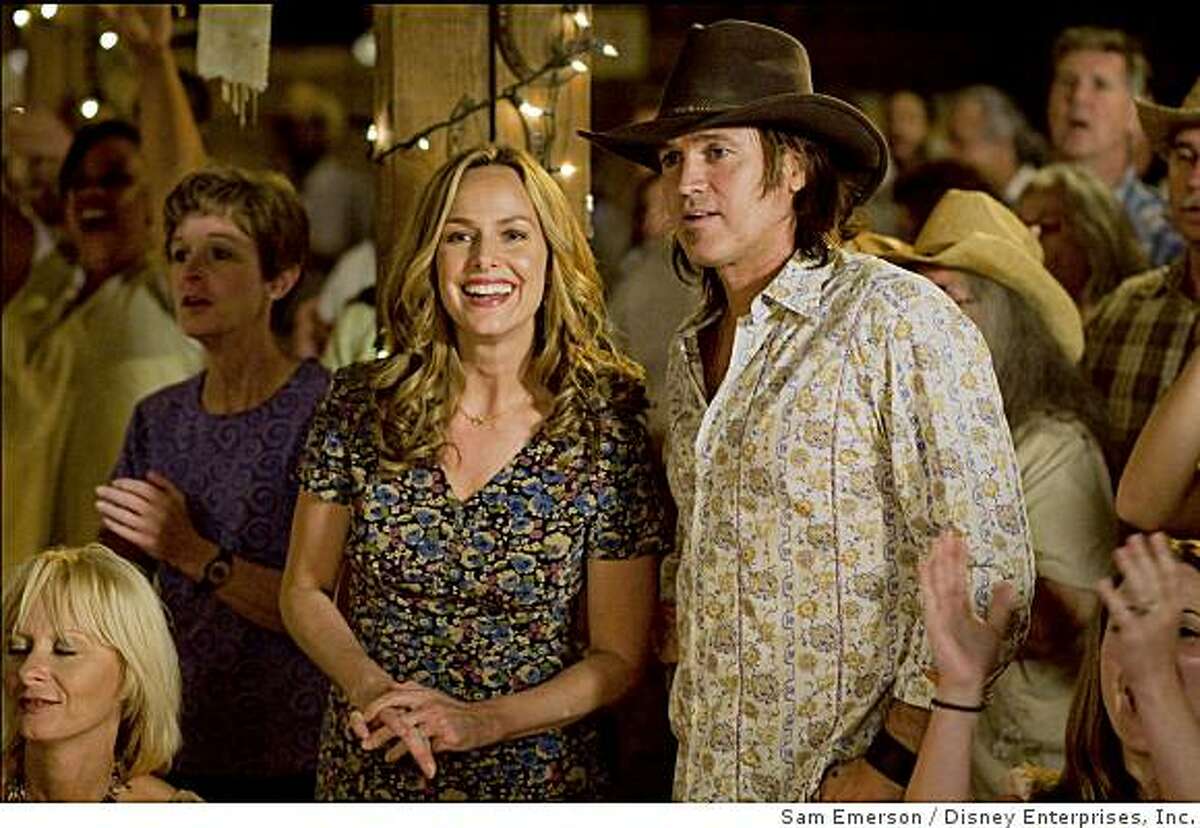 (l to r) MELORA HARDIN, BILLY RAY CYRUS in "Hannah Montana: The Movie"