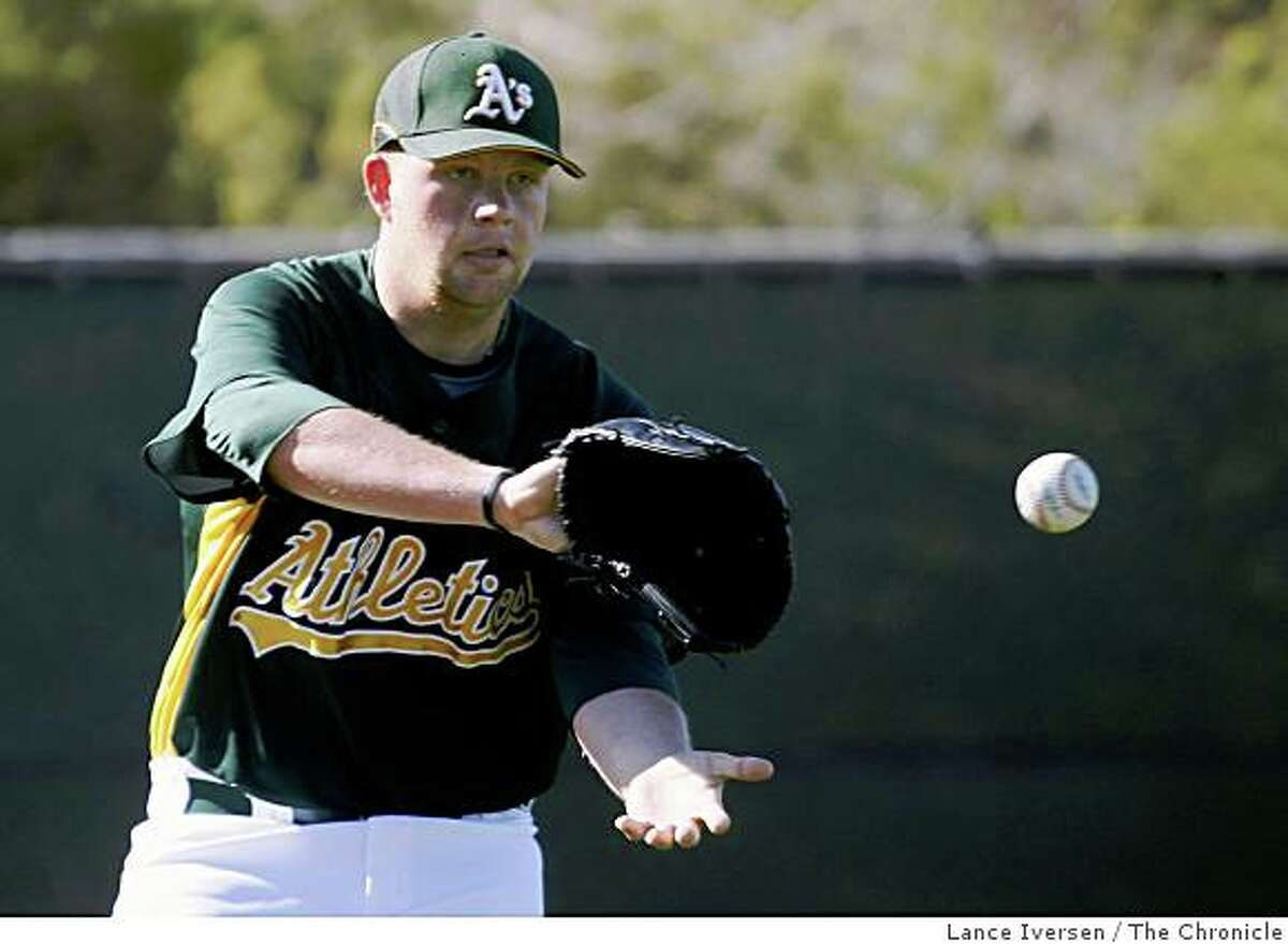 Oakland Athletics Brett Anderson covers first base during Spring Training at Phoenix Municipal Stadium Tuesday February 24, 2009 in Phoenix.
