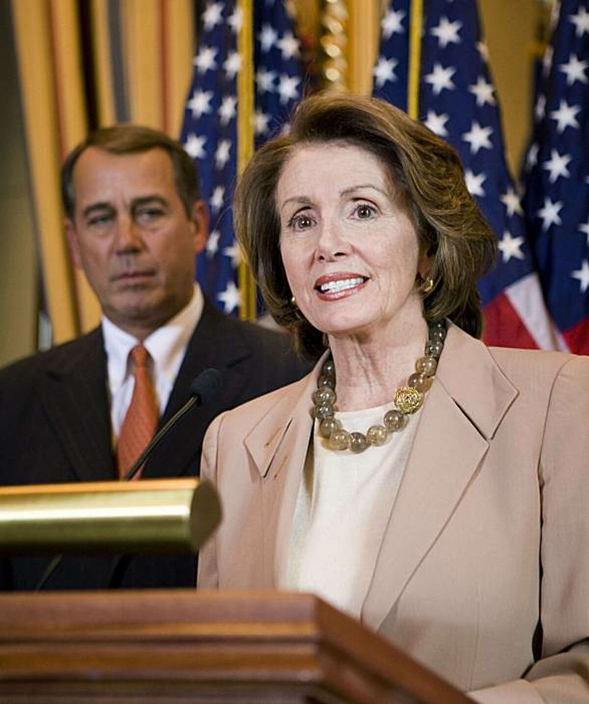 Speaker of the House Nancy Pelosi (D-CA) and House Minority Leader John Boehner (R-OH) speak at a press conference about the passage of a bipartisan economic stimulus package by the House of Representative on Capitol Hill in Washington, DC January 29, 2008. REUTERS/Joshua Roberts (UNITED STATES)