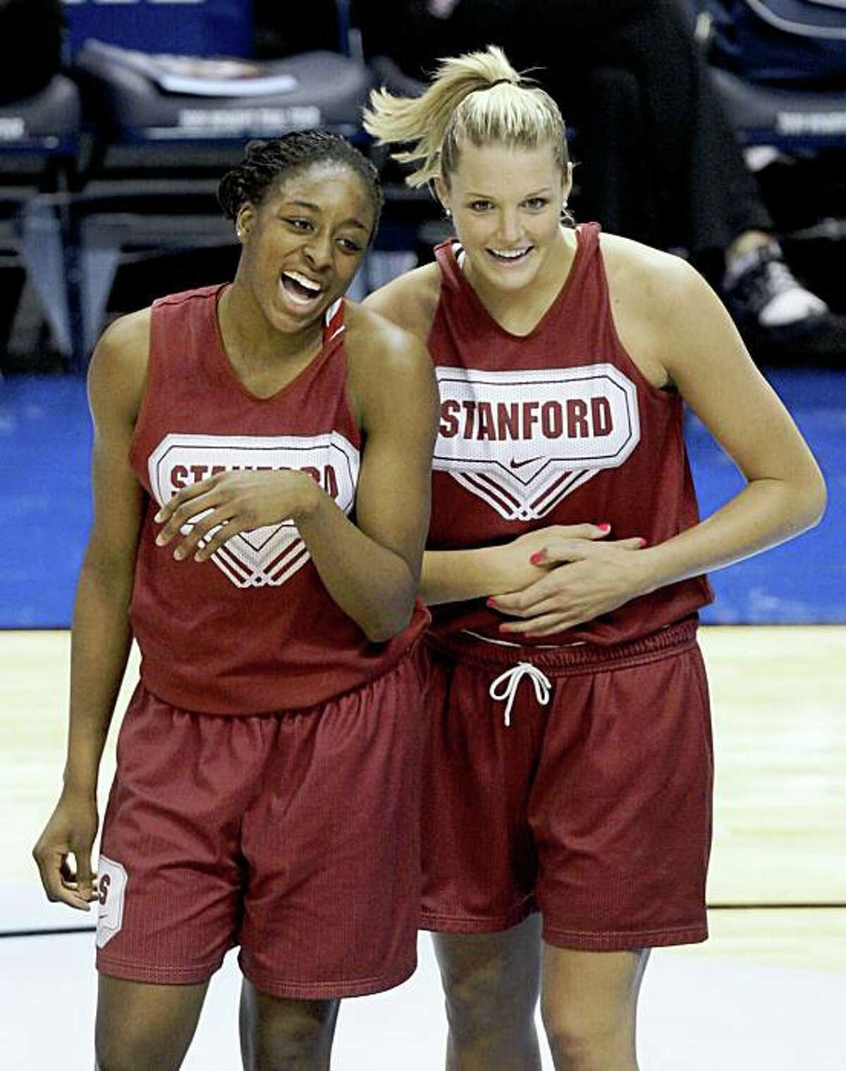 Stanford's Nnemkadi Ogwumike, left, and Jayne Appel react during basketball practice at the NCAA Women's Final Four, Saturday, April 4, 2009, in St. Louis. (AP Photo/Jeff Roberson)