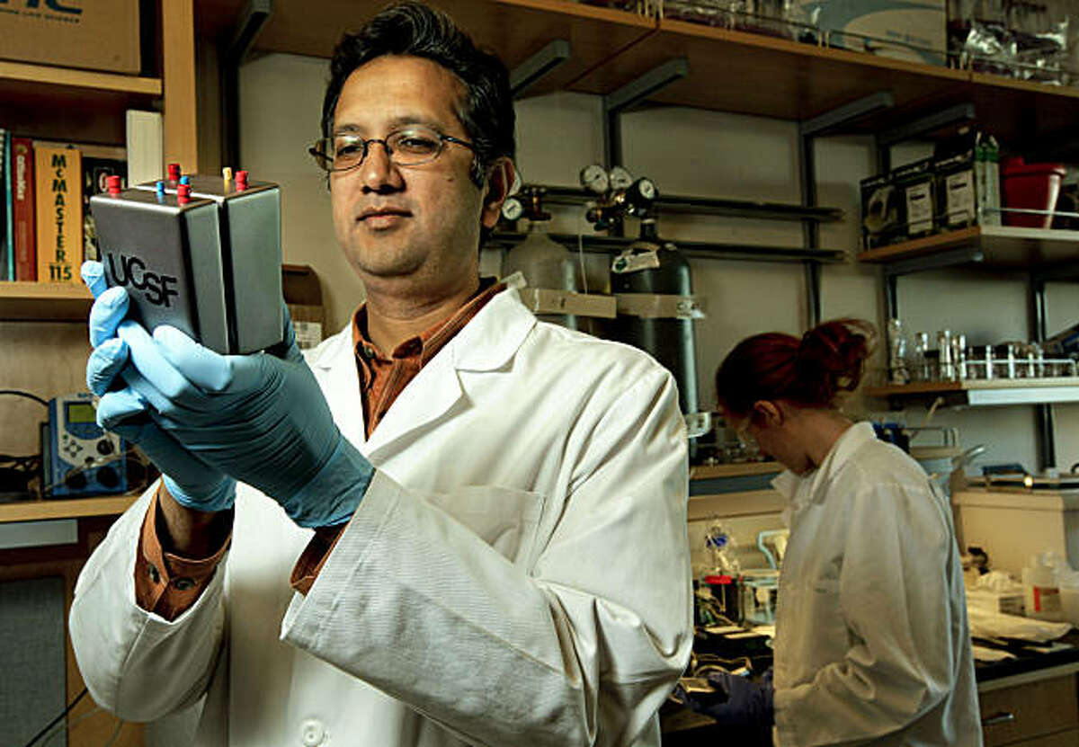 Shuvo Roy, an associate professor at the University of California, San Francisco, holds the implantable bioartificial kidney, on Friday Nov. 12, 2010. Roy is the lead designer of an artificial kidney project at the UCSF research center, in San Francisco, Calif.