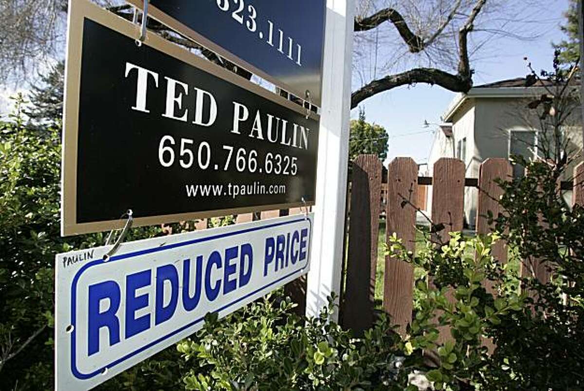 ** FILE ** In this Jan. 26, 2009 file photo, a "Reduced Price" sign is shown at a home for sale in Palo Alto, Calif. Home prices sank by the sharpest annual rate on record in January, and the pace continues to accelerate, but there were a handful battered metro areas where price declines slowed, according to data released Tuesday, March 31, 2009.
