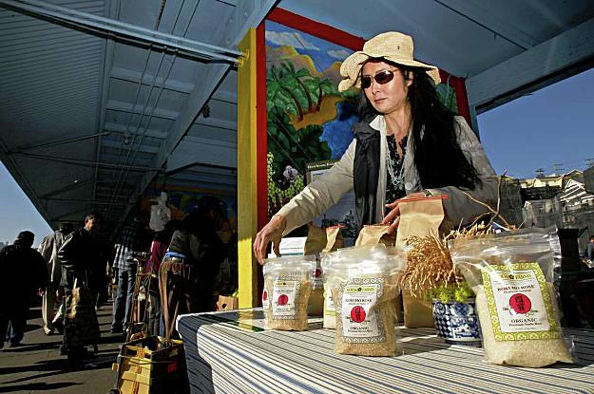 Robin Koda, at the Alemany Farmers Market, on Saturday Jan. 31, 2009, in San Francisco, Calif., where she displays her bags of Heirloom Varietal rice she produces at her farm in the San Joaquin Valley.