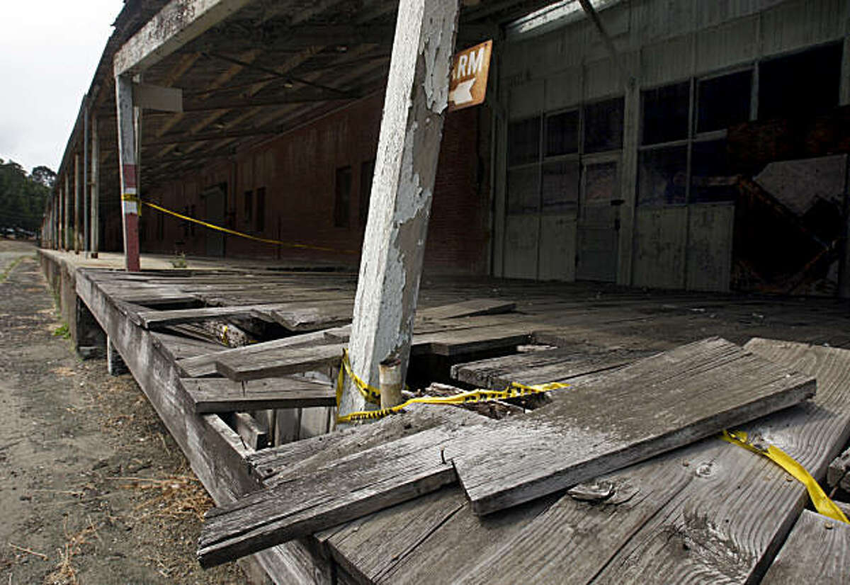 Broken wooden planks render a deck useless on the backside of the Winehaven warehouse at the old Point Molate Naval Supply Center in Richmond, Calif., on Tuesday, Aug. 11, 2009. The Guideville Band of Pomo Indians tribe is seeking permission to build a massive resort and casino on the former military depot located about a mile north of the Richmond-San Rafael Bridge.
