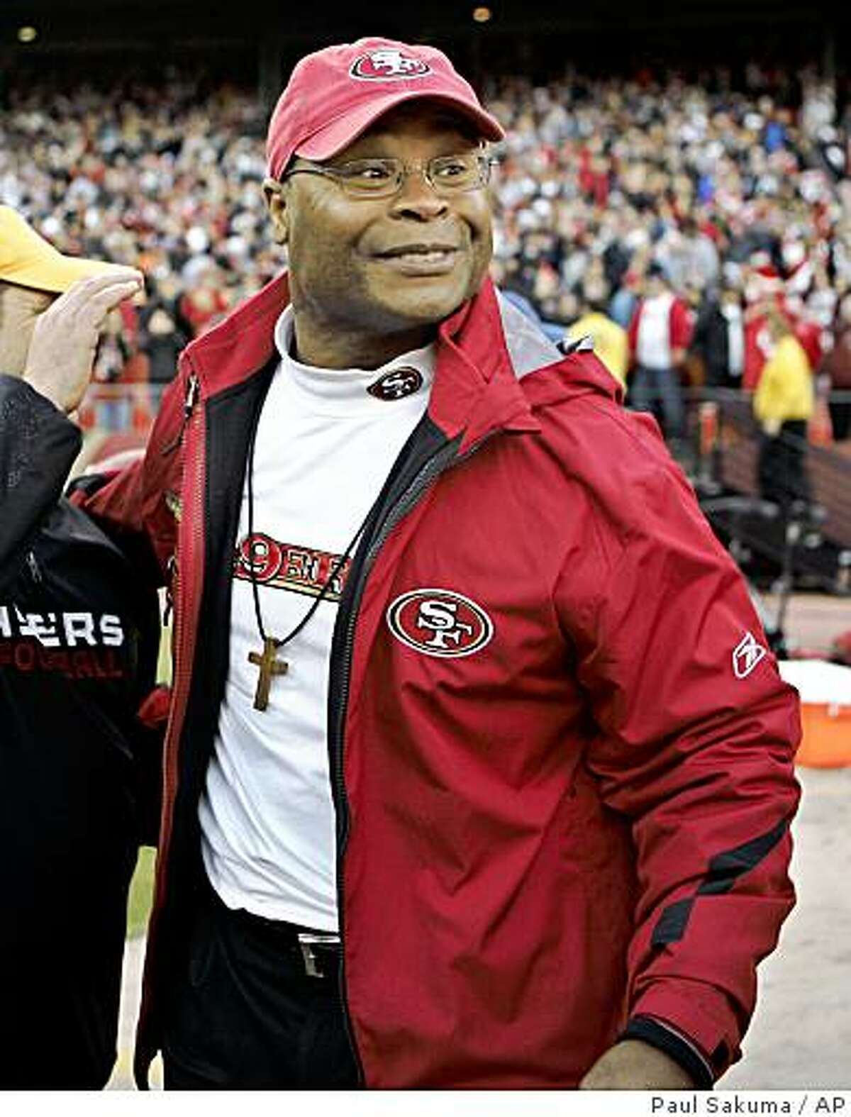 San Francisco 49ers head coach Mike Singletary smiles after the 49ers defeated the Washington Redskins 27-24 in a game in San Francisco, Sunday, Dec. 28, 2008.