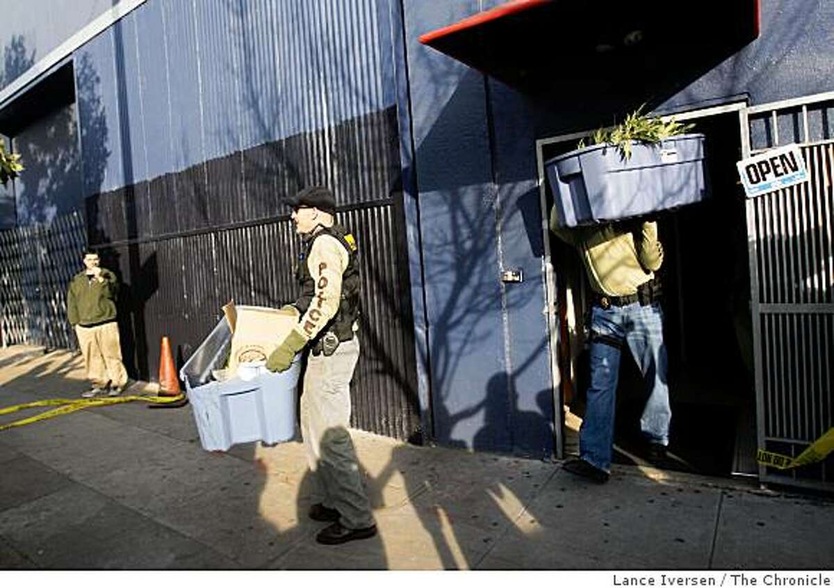 Federal agents raided Emmalyn's Collective Cooperative pot club in San Francisco on Howard Street, Wednesday, March 25, 2009 removing dozens of plants and equipment.