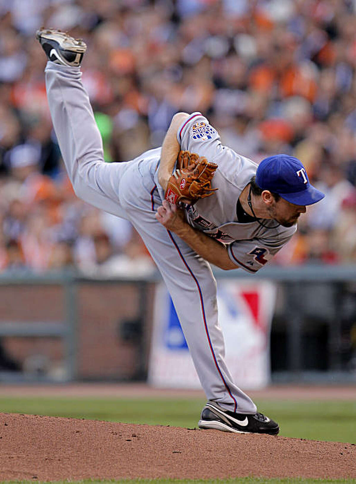 Rangers starting pitcher Cliff Lee throws in the first inning as the San Francisco Giants take on the Texas Rangers in Game 1 of the World Series at AT&T Park in San Francisco, Calif., on Wednesday, October 27, 2010.