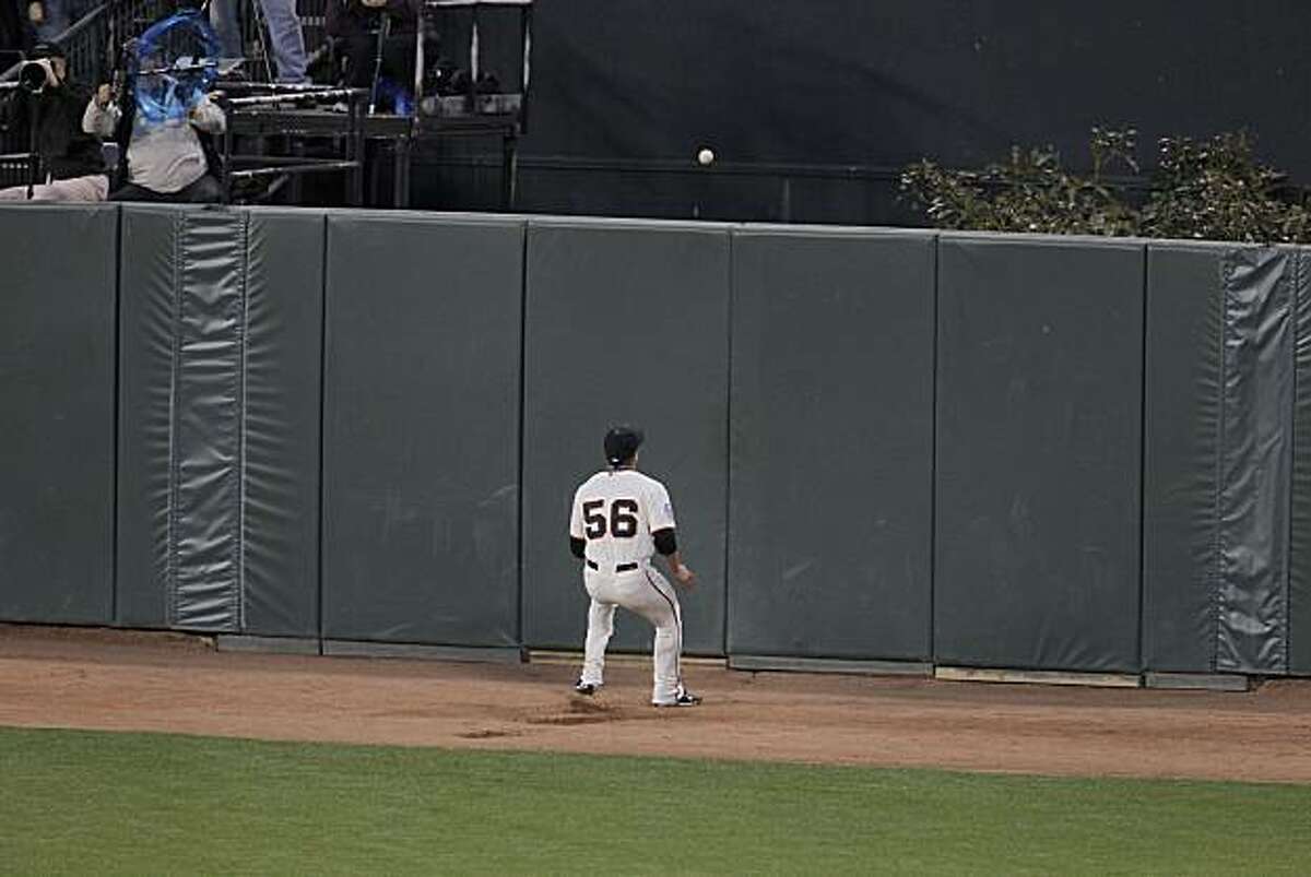 Giants Andres Torres watches Ian Kinsler's hit to center bounce off the wall for a double in the fifth inning as the San Francisco Giants take on the Texas Rangers in Game 2 of the World Series at AT&T Park in San Francisco, Calif., on Thursday, October 28, 2010.