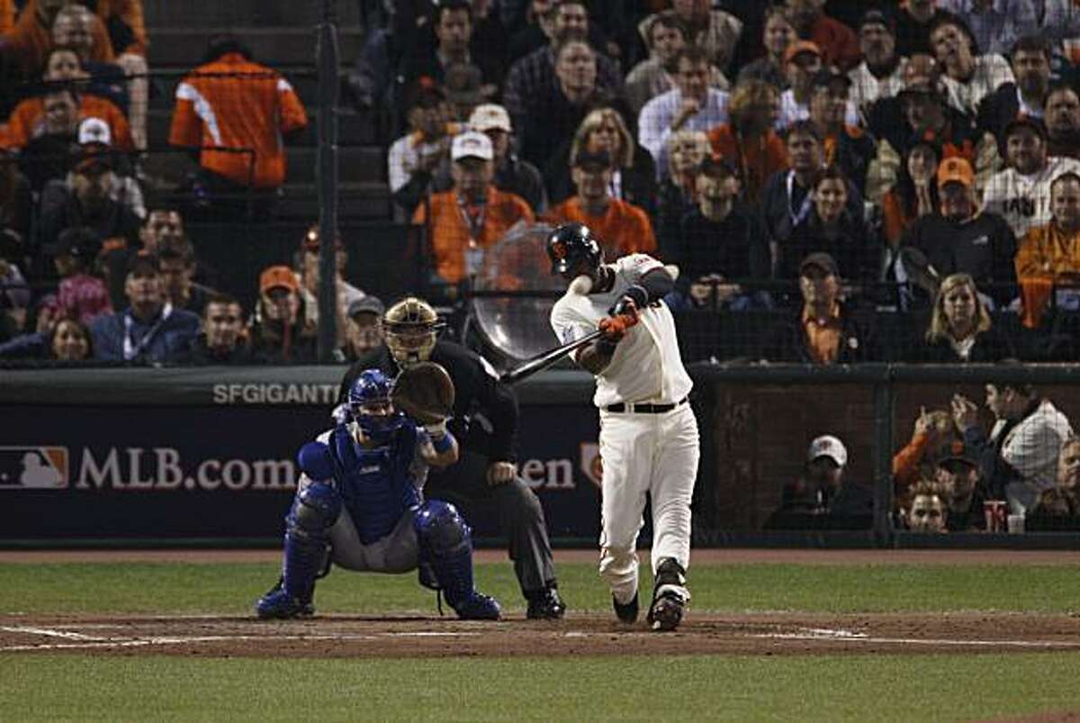 Giants Edgar Renteria hits a solo home run in the fifth inning to give the Giants a 1-0 lead as the San Francisco Giants take on the Texas Rangers in Game 2 of the World Series at AT&T Park in San Francisco, Calif., on Thursday, October 28, 2010.