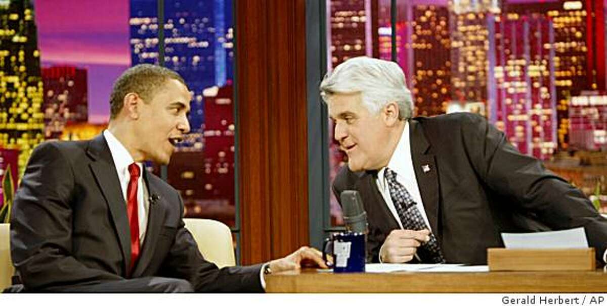 President Barack Obama, left, appears on The Tonight Show with Jay Leno in Burbank, Calif. Thursday, March 19, 2009. (AP Photo/Gerald Herbert)