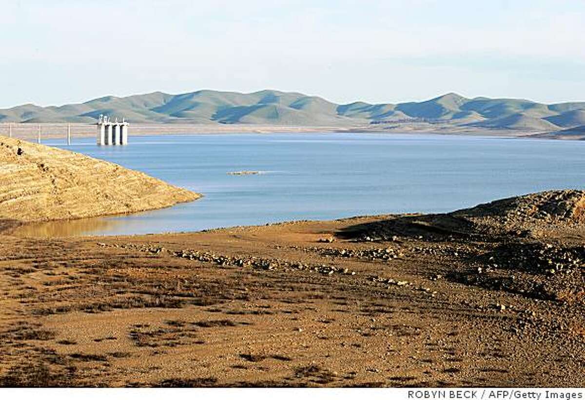 TO GO WITH AFP STORY by TANGI QUEMENERWater levels are low at the San Luis Reservoir, near Los Banos, California on March 11, 2009. Due to low rainfall and environmental conservation concerns, the storage of water at the reservoir is at the lowest in a quarter-century -- about a third of its usual level, leaving farmers in California's agricultural center of the San Joaquin Valley without enough water to grow their crops. AFP PHOTO Robyn BECK (Photo credit should read ROBYN BECK/AFP/Getty Images)