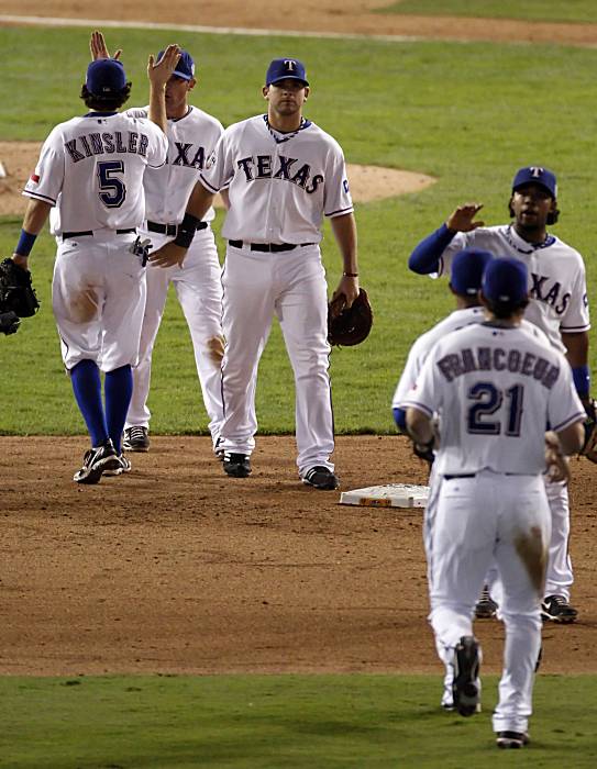 San Francisco Giants second baseman Freddy Sanchez gets the out on Texas  Rangers left fielder Josh Hamilton to end the fourth inning of Game 4 of  the World Series on Sunday. (Michael