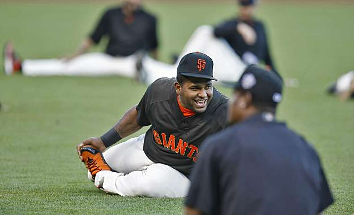 San Francisco Giants Pablo Sandoval laughs with teammates during practice, in preparation of the Game 1 of the World Series, Tuesday Oct. 26, 2010, at AT&T Park, in San Francisco, Calif.