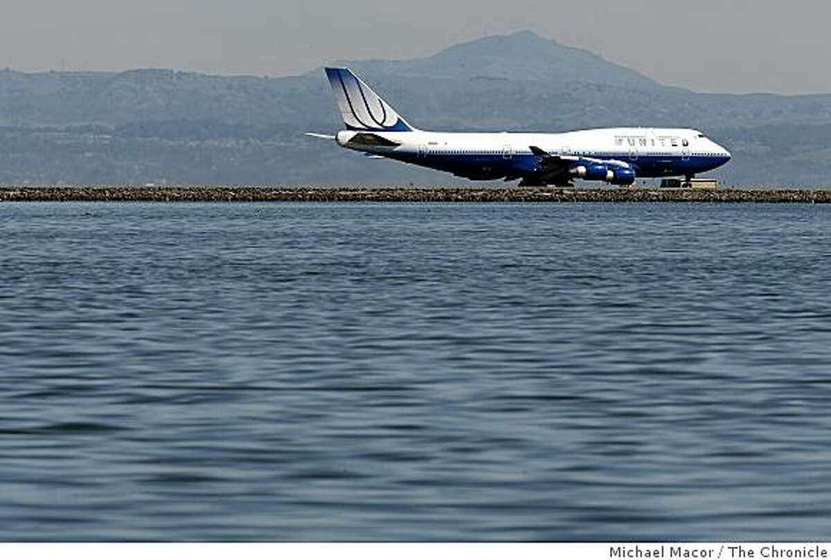 The runways at San Francisco International Airport may well be under water by the end of this century as the ocean is expected to rise nearly five feet along California's coastline, according to a report to the state released on Wednesday Mar. 11, 2009.