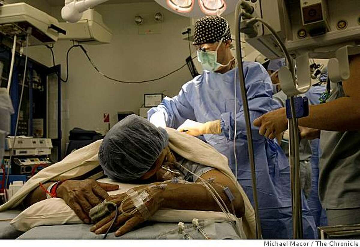 Dr. James Constant during a surgical procedure at Kaiser Permanente Hospital in San Francisco, Calif., which is conducting free surgeries on several dozen poor and uninsured people, on Saturday Mar. 7, 2009.