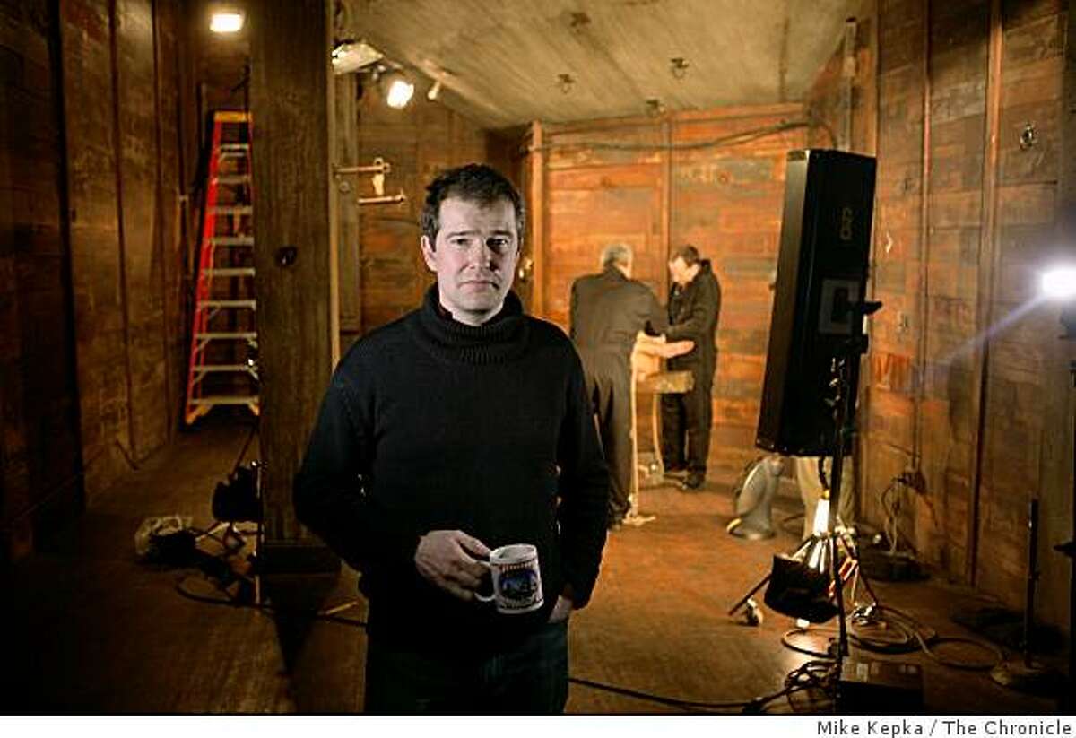Peter Acworth, owner and CEO of Kink.com, stands for a portrait on a movie set in their office building, on Monday Feb. 23, 2009 in San Francisco, Calif. Acworth says his business is having trouble competing with new websites that are giving content away for free.