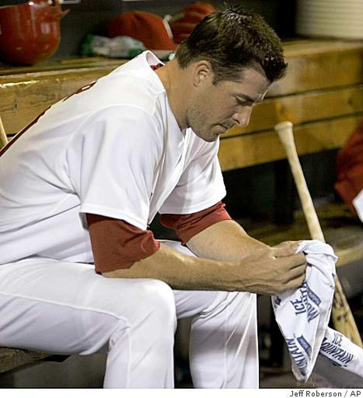 St. Louis Cardinals relief pitcher Mark Mulder sits on the bench after being pulled out of the baseball game during the seventh inning against the New York Mets, Wednesday, July 2, 2008, in St. Louis. (AP Photo/Jeff Roberson)