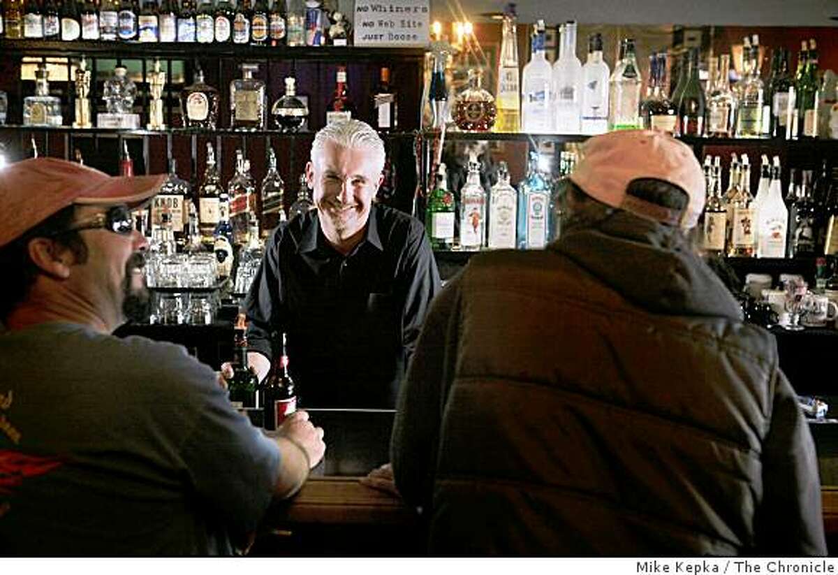 Ray Rex, owner The Hearth on Geary Street, stands behind his bar on Thursday Feb. 19, 2009 in San Francisco, Calif.