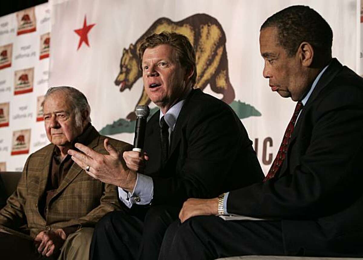 Former state Assemblyman Guy Houston, R-Pleasanton, center, flanked by former Assemblyman William Bagley, R-Marin, left, and Elihu Harris, D-Oakland, discusses ways to reform state government during a summit in Sacramento, Calif., Tuesday, Feb. 24, 2009. Delegates at the California Constitutional Convention Summit debated whether the state Constitution should be completely rewritten. (AP Photo/Rich Pedroncelli)