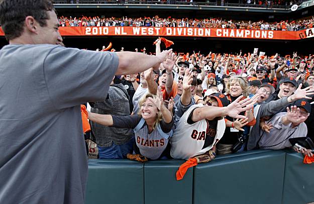 Giants manager Bruce Bochy and closer Brian Wilson celebrate a 3-0 win over  the San Diego Padres and the NL West title at AT&T Park on Sunday. (Paul  Chinn/San Francisco Chronicle via