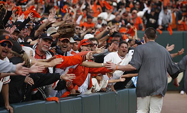 Giants manager Bruce Bochy and closer Brian Wilson celebrate a 3-0 win over  the San Diego Padres and the NL West title at AT&T Park on Sunday. (Paul  Chinn/San Francisco Chronicle via