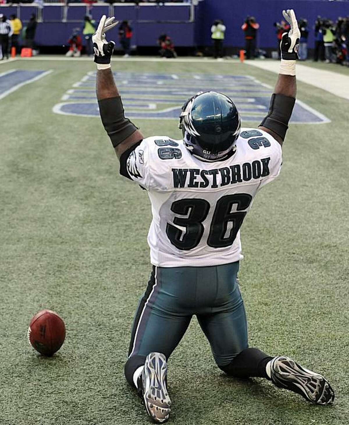 Philadelphia Eagles' Brian Westbrook reacts after scoring on a 40-yard touchdown pass during the fourth quarter of an NFL football game against the New York Giants Sunday, Dec. 7, 2008 at Giants Stadium in East Rutherford, N.J. The Eagles won 20-14. (AP Photo/Bill Kostroun)