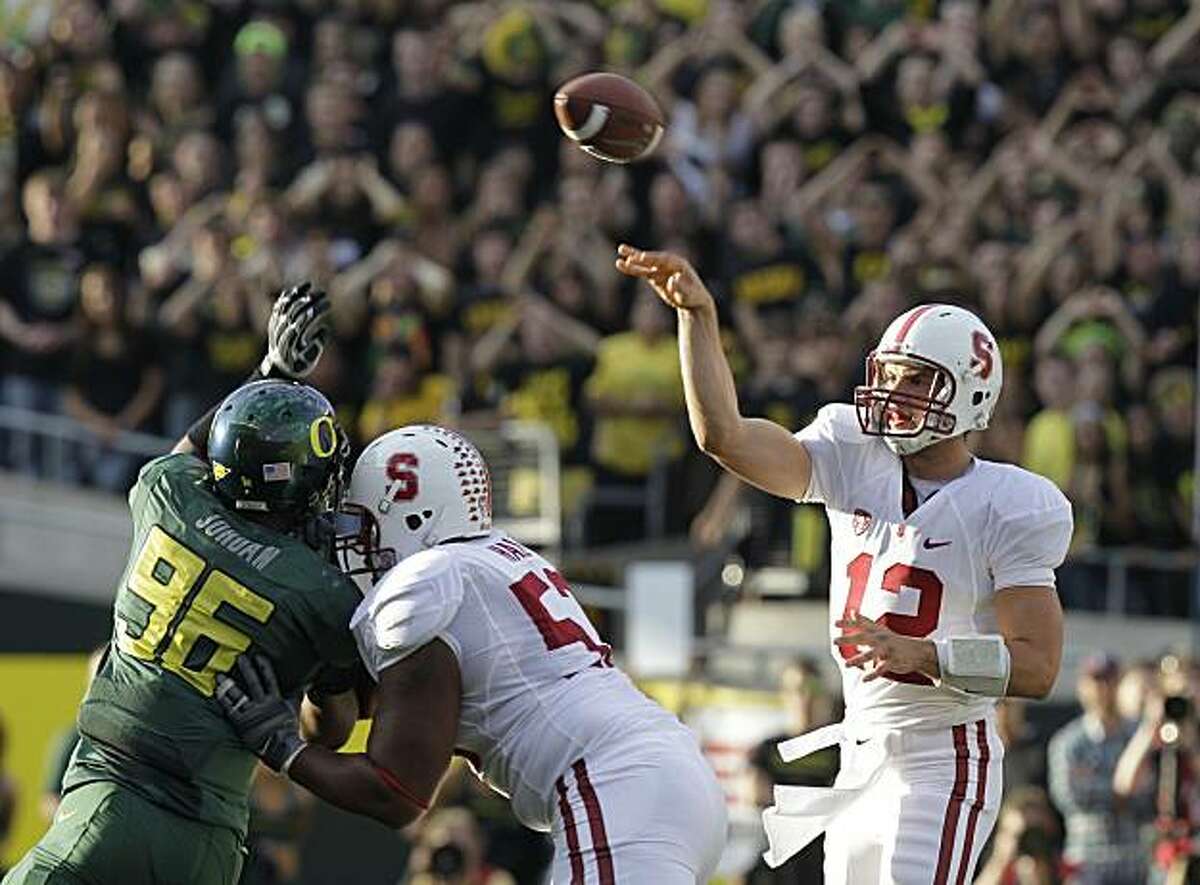 Stanford quarterback Andrew Luck (12) throws against Oregon in the first half of an NCAA college football game Saturday, Oct. 2, 2010, in Eugene, Ore.