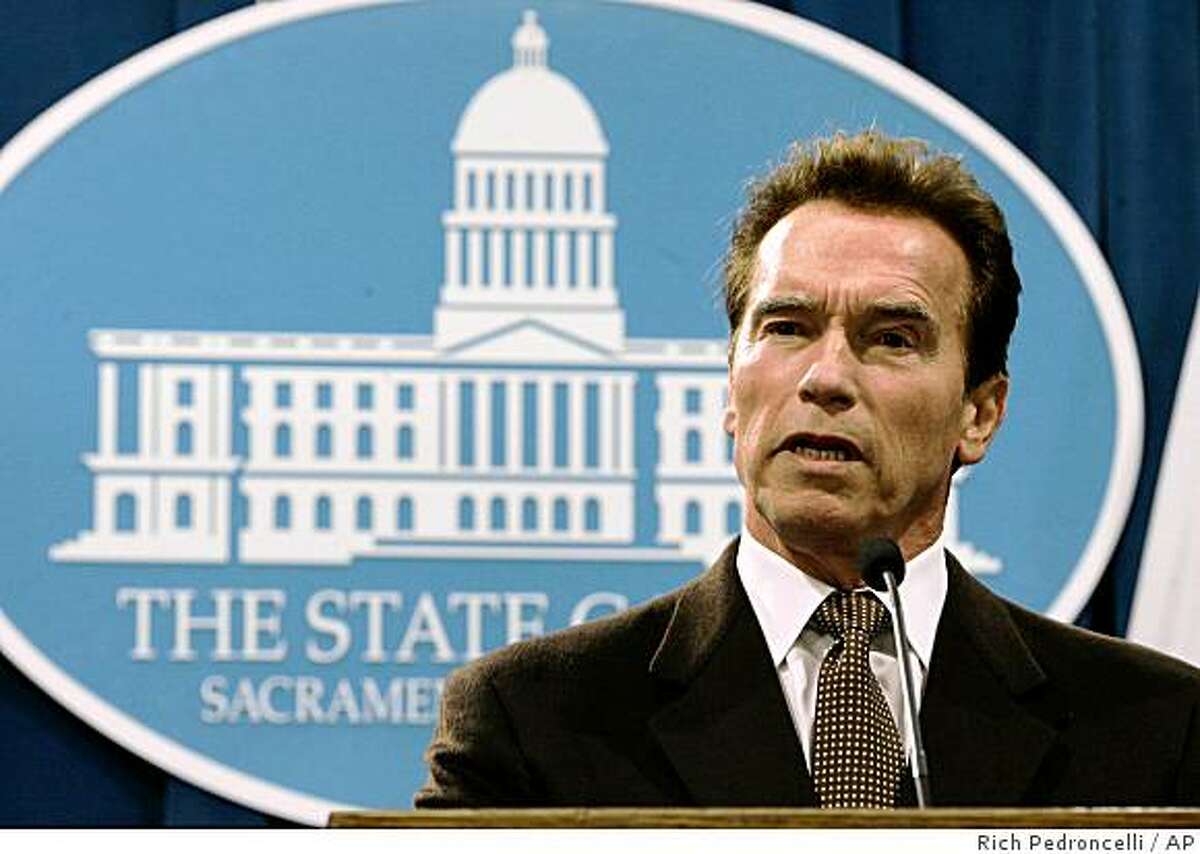 Gov. Arnold Schwarzenegger calls on state lawmakers to settle their differences and reach a solution to the growing state budget deficit during a Capitol news conference in Sacramento, Calif., Wednesday, Dec. 10, 2008.(AP Photo/Rich Pedroncelli)