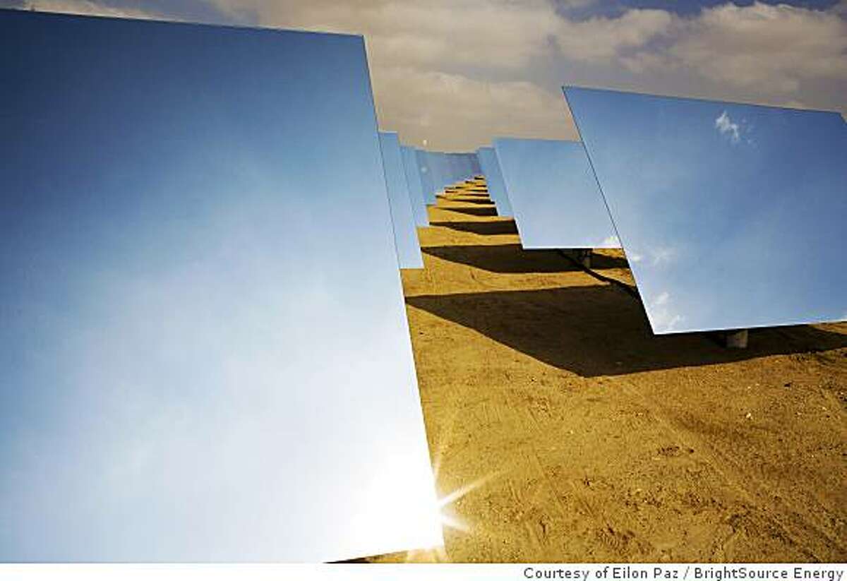 Sunlight bounces off mirrors at BrightSource Energy's solar plant in Israel's Negev Desert on Nov. 12, 2008. The California-based company hopes to benefit from green technology provisions in Congress' stimulus package.