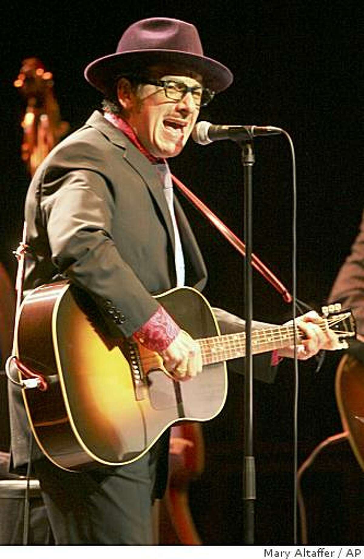 British singer-songwriter Elvis Costello performs with The Sugarcanes Wednesday, June 10, 2009 at the Beacon Theater in New York.