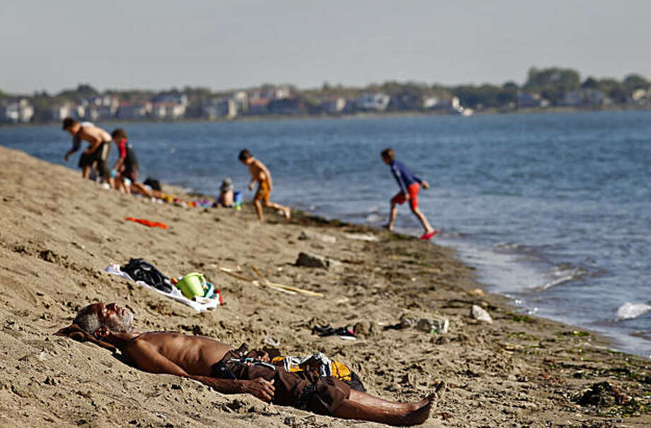 Swimmer S Itch Strikes Alameda Beach Twice Sfgate Mavin Dixon From Oakland Lays In The Sun Tuesday Sept 28 2010