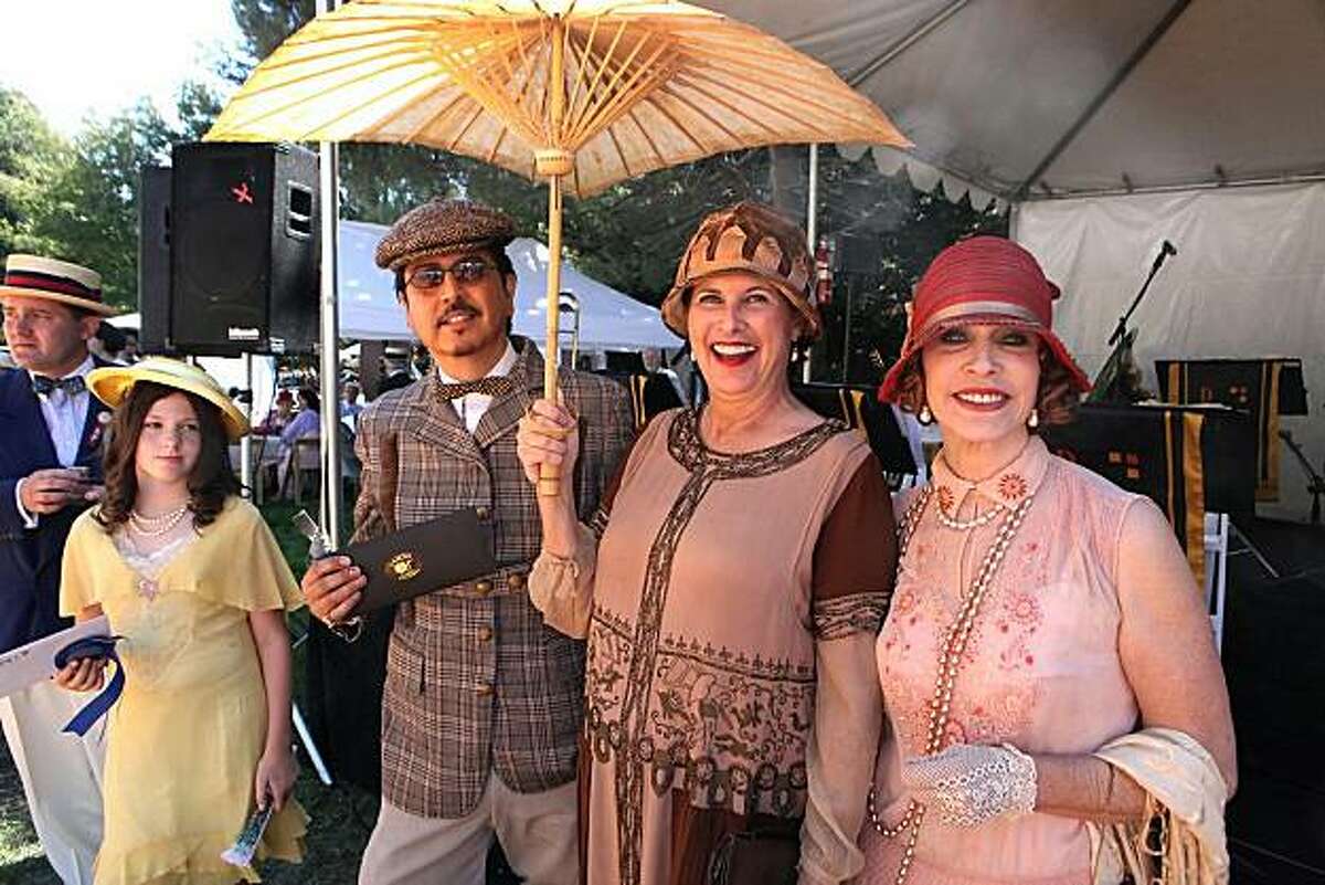 Best dressed lady Martha Chilvers (in brown) with best dressed man and best dressed child and judge Cicely Hansen at Gatsby Summer Afternoon Sept. 12.