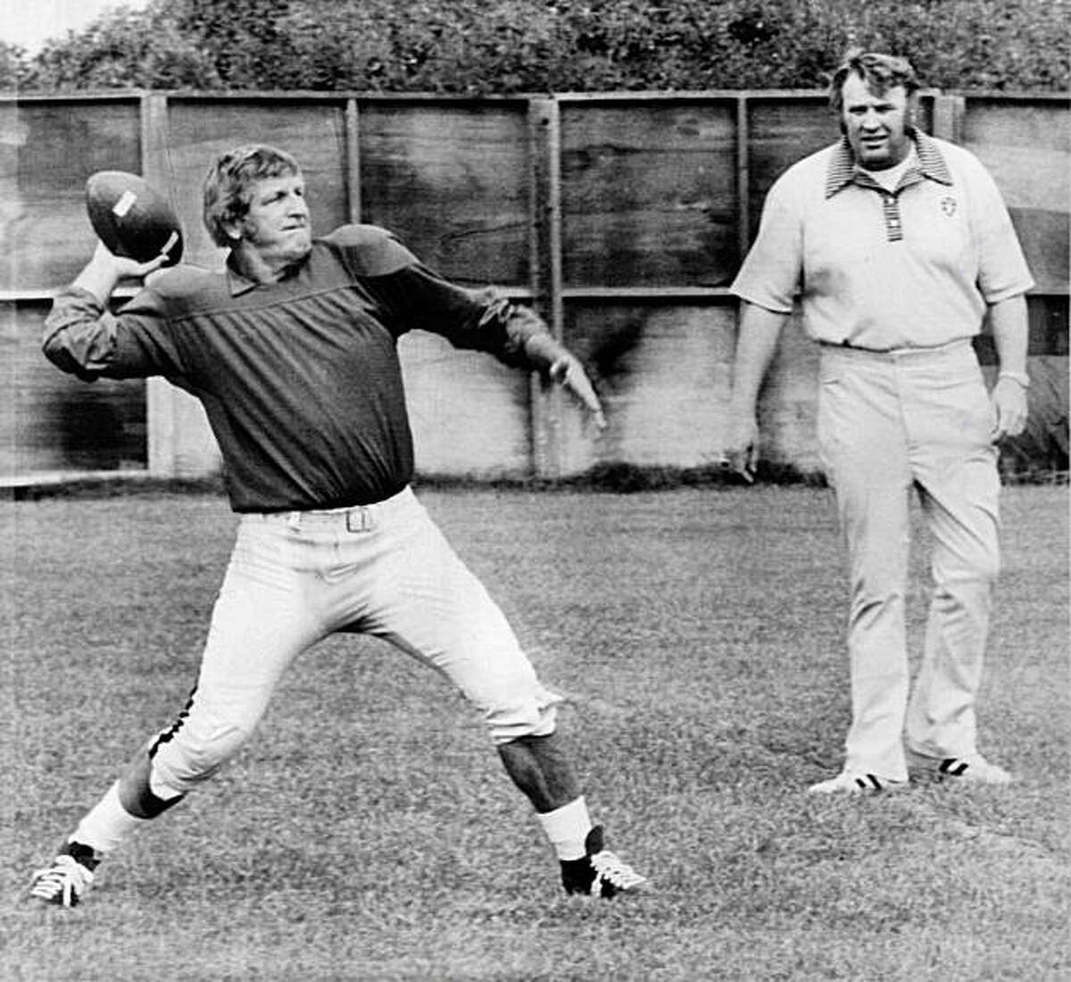 Going strong at age 48. Veteran quarterback and kicker George Blanda of the Oakland Raiders gets set to toss the ball during practice on Wednesday in Oakland, under the watchful eye of head coach John Madden. Wednesday was Blanda's 48th birthday. He's entGoing strong at age 48. Veteran quarterback and kicker George Blanda of the Oakland Raiders gets set to toss the ball during practice on Wednesday in Oakland, under the watchful eye of head coach John Madden. Wednesday was Blanda's 48th birthday. He's entering his 26th pro season and is just 81 points shy of becoming the first 2,000 point scorer in pro football history. Photo was taken September 18, 1975.